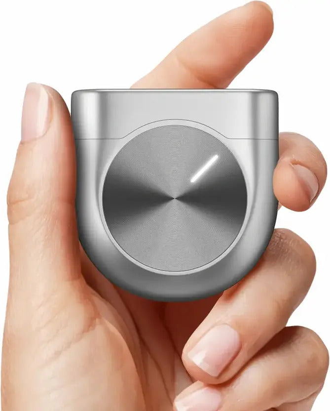 User holding CTRL8 True Wireless Master Earbuds metallic charging case with ergonomic design