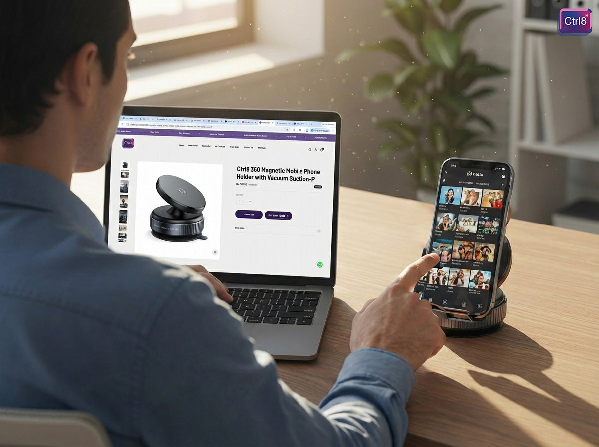Person using CTRL8 360 Magnetic Mobile Phone Holder for hands-free phone browsing on a desk
