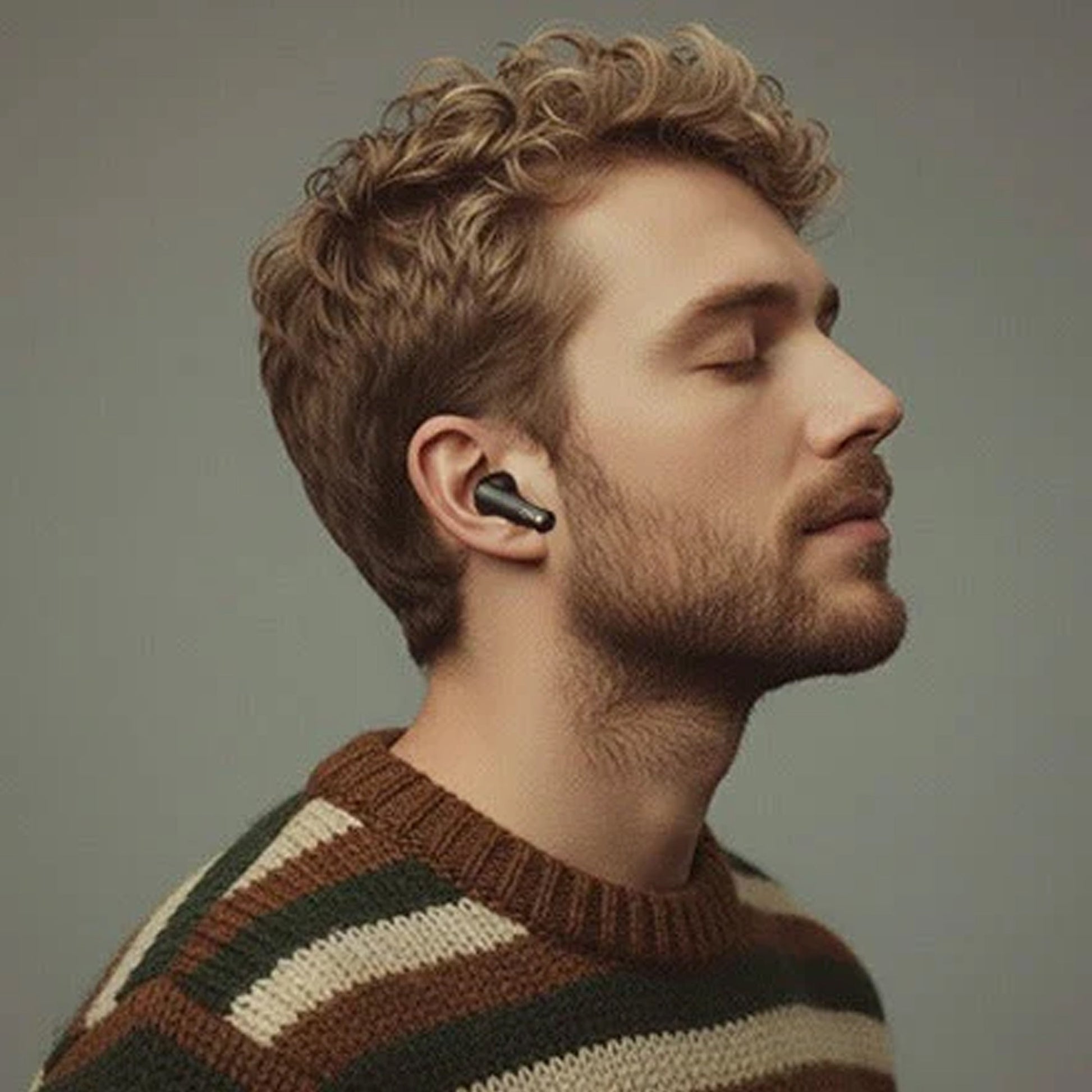 User wearing CTRL8 wireless earbuds for seamless audio experience during daily activities