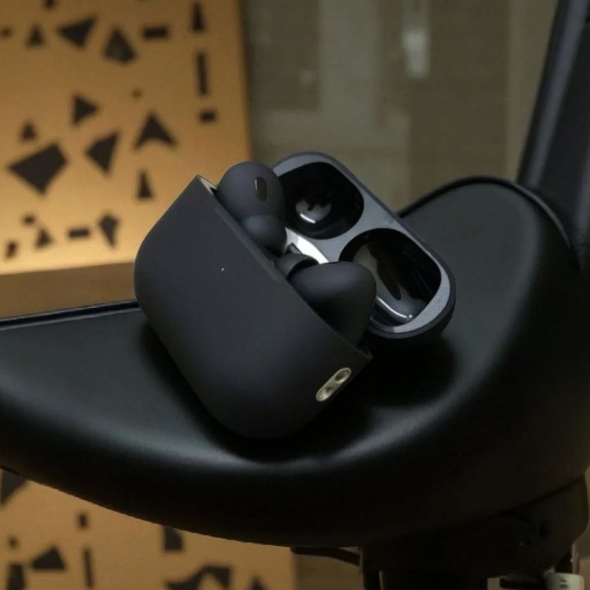 CTRL8 Wireless Airpods Pro 2 resting on a modern surface, highlighting sleek design and portability