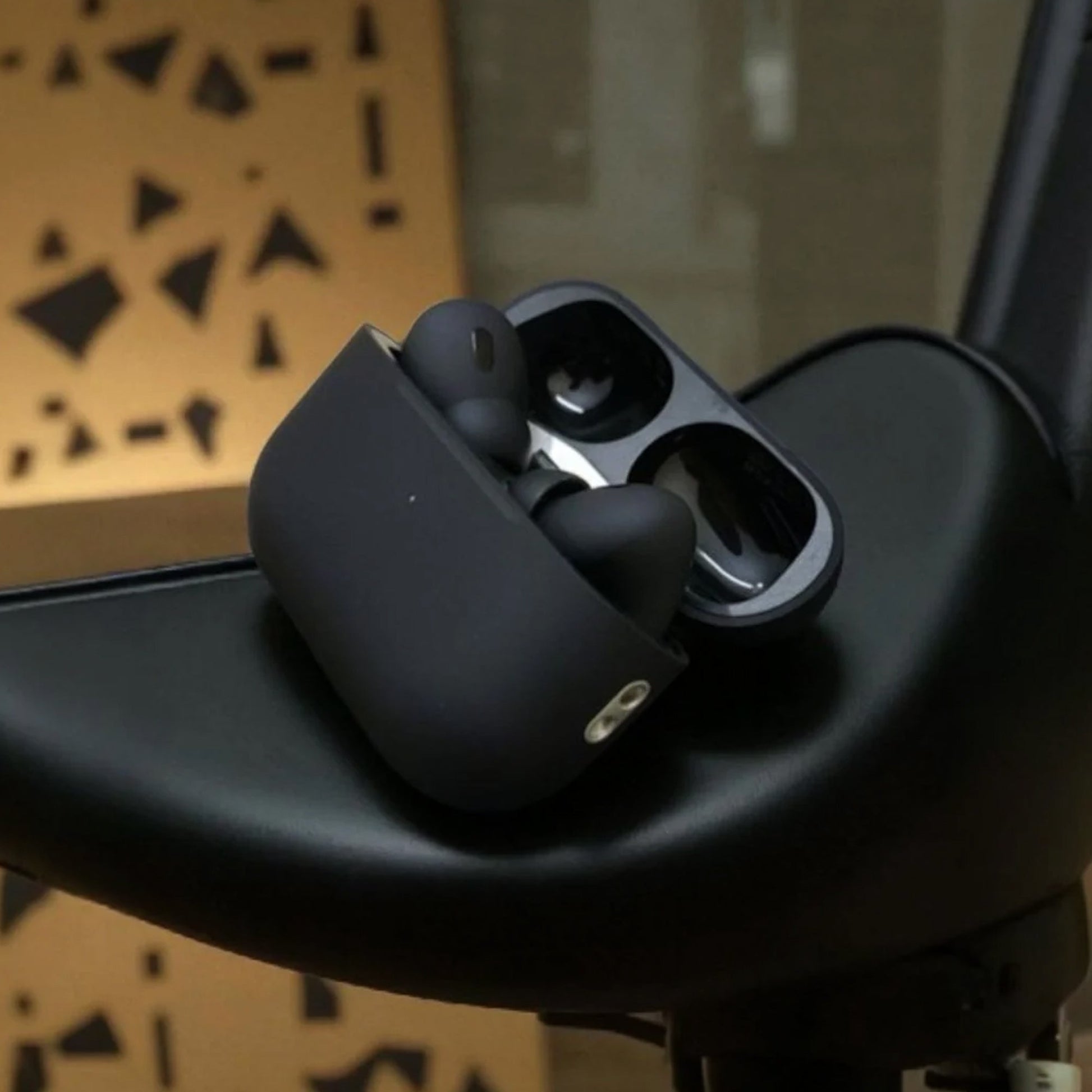 CTRL8 Wireless Airpods Pro 2 resting on a modern surface, highlighting sleek design and portability