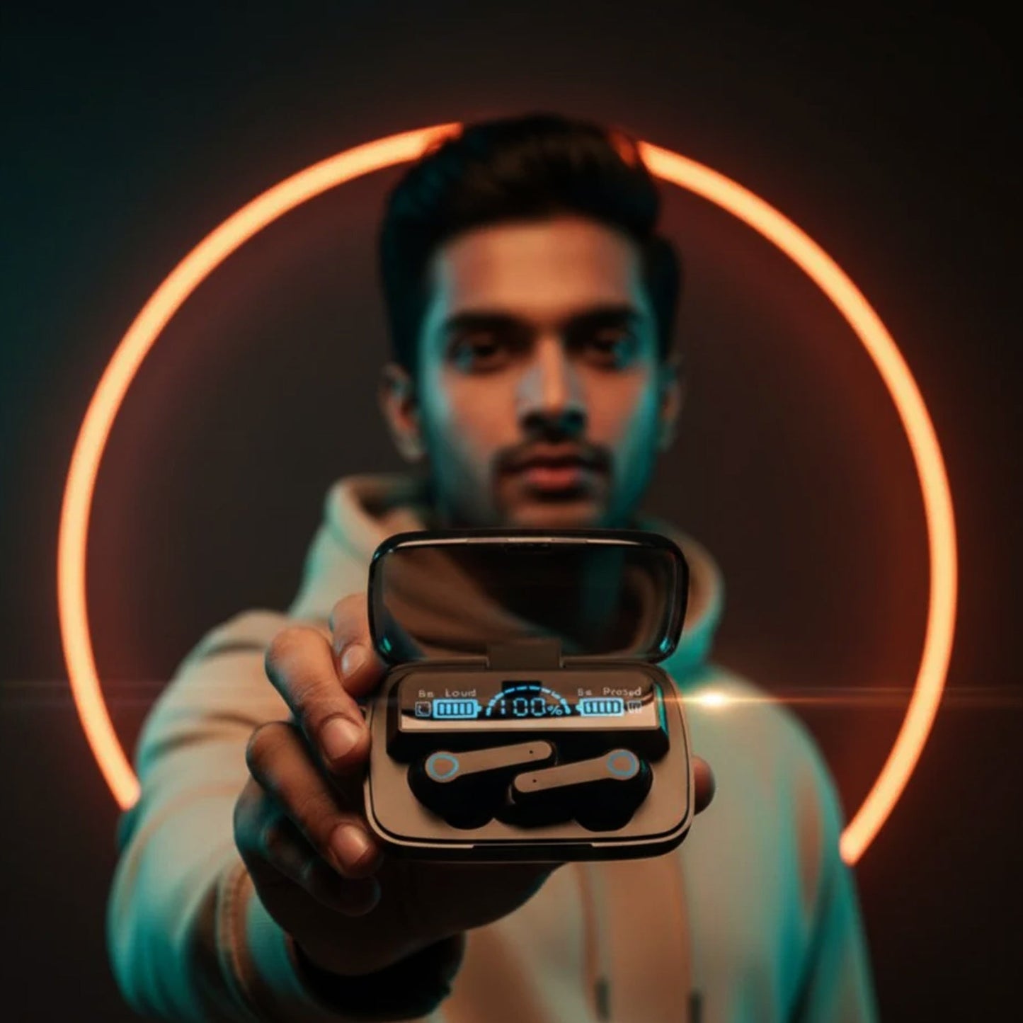 Gamer showcasing CTRL8 UltraBass M19 true wireless gaming earbuds with LED display and charging case
