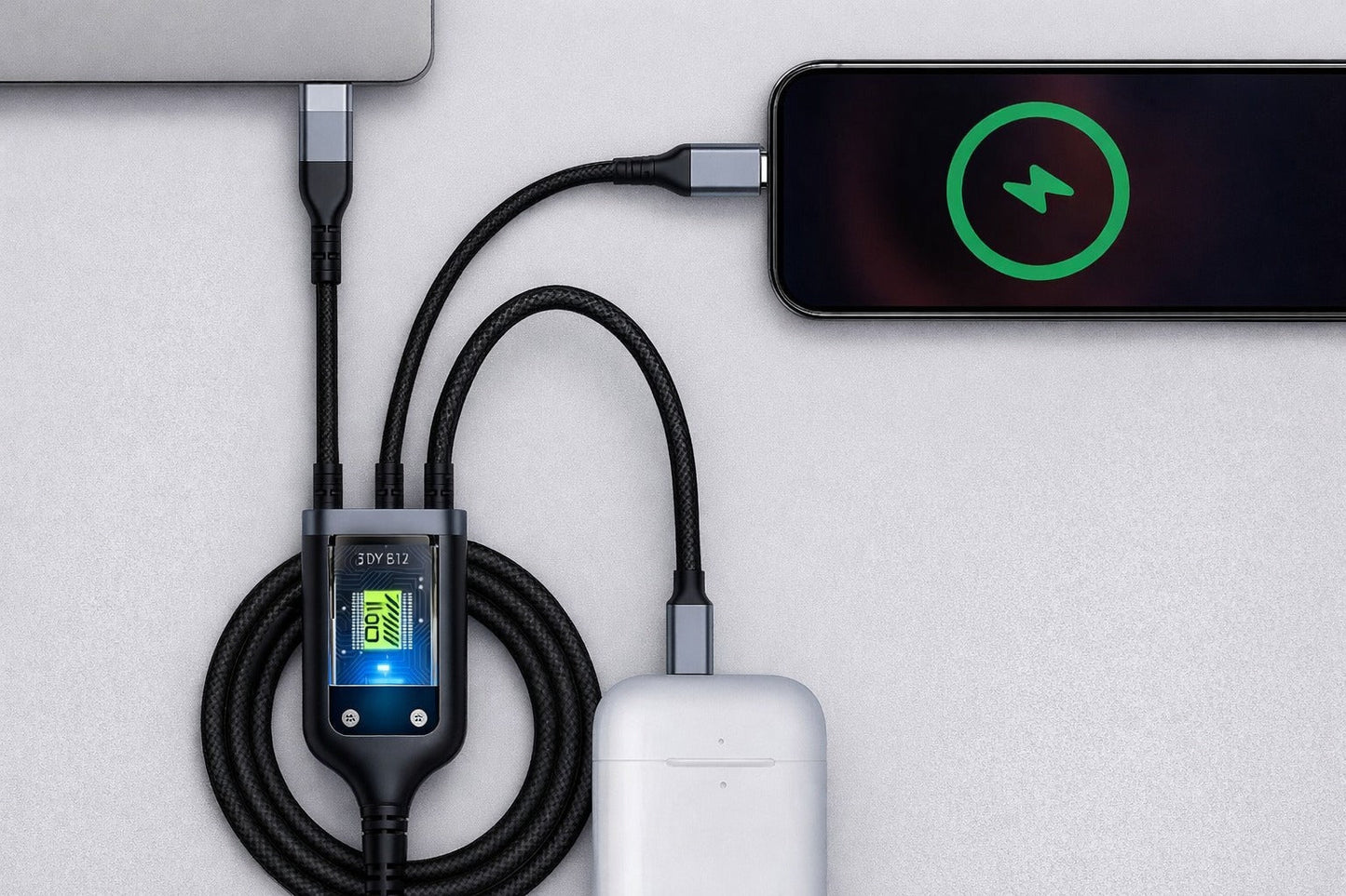 CTRL8 3-in-1 fast charging cable powering a smartphone, laptop, and earbuds simultaneously in a sleek setup