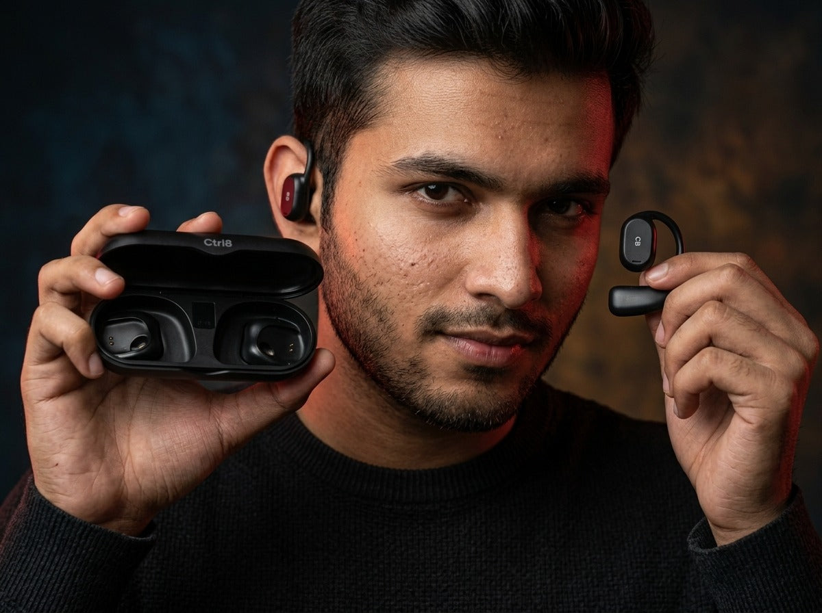 User showcasing CTRL8 X29 open-ear headphones with charging case for hands-free audio experience