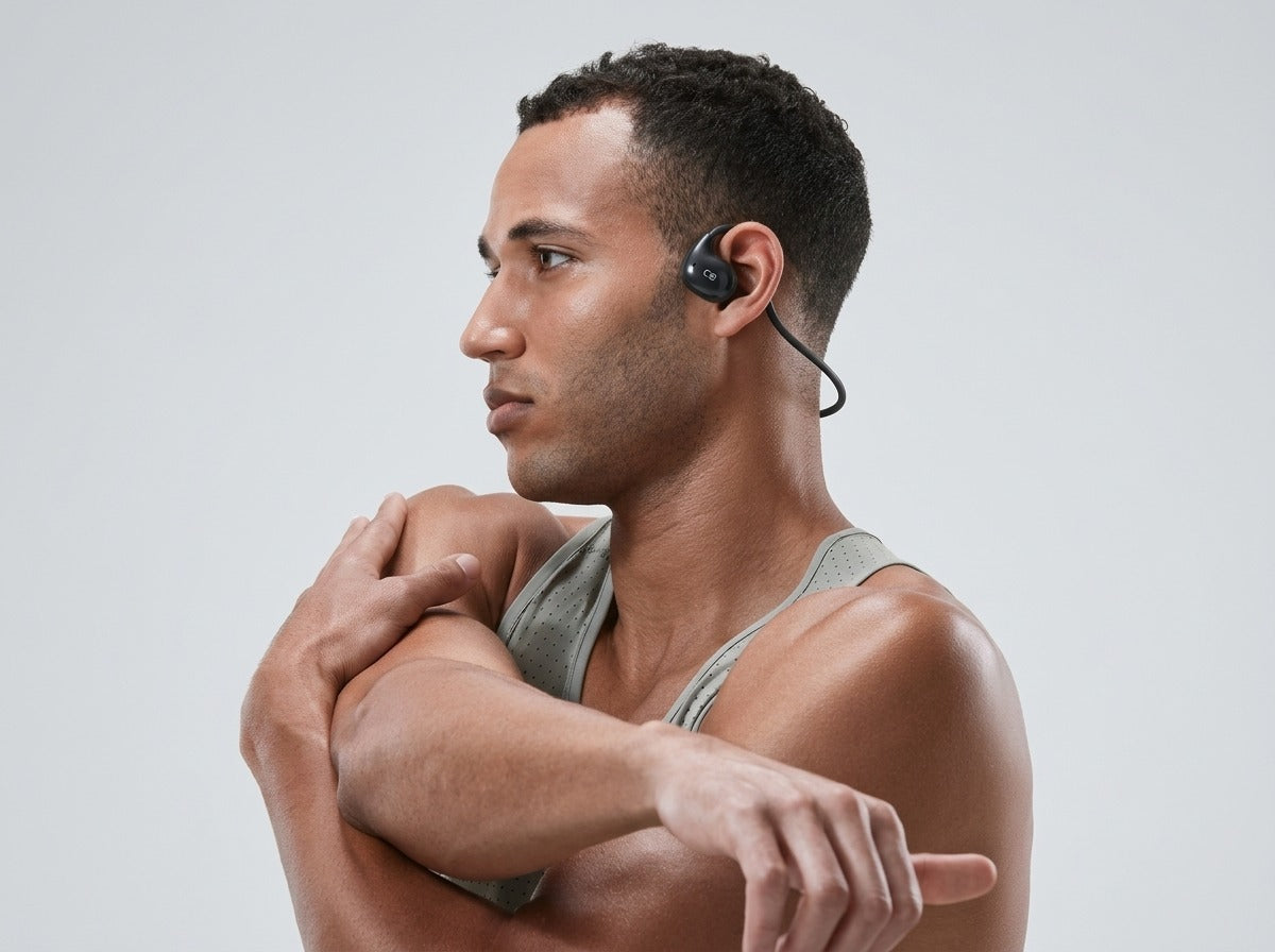 Athlete wearing CTRL8 VV4 Air Bone Conduction Neckband for hands-free music during a workout
