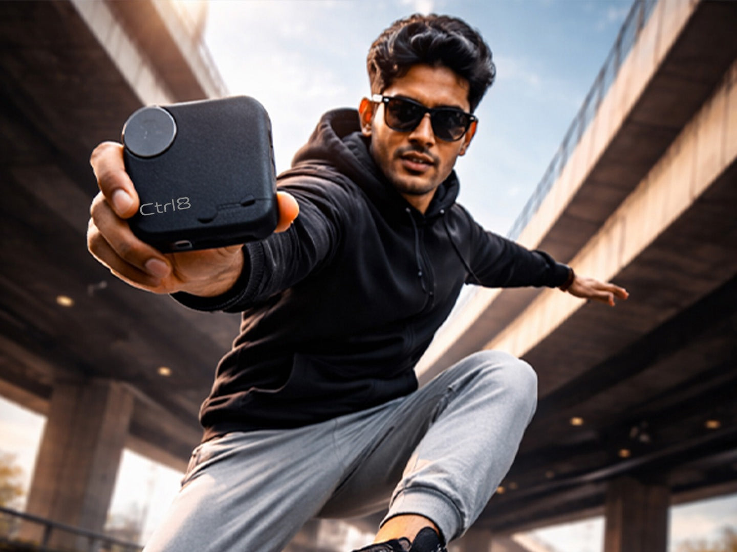 Active user showcasing CTRL8 CMT Ultra Pro true wireless noise-cancelling earbuds case during outdoor activity