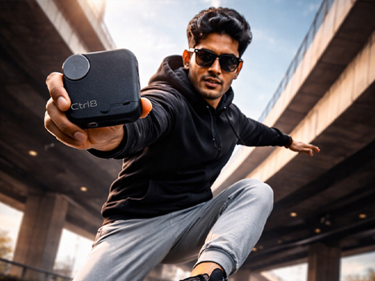 Active user showcasing CTRL8 CMT Ultra Pro true wireless noise-cancelling earbuds case during outdoor activity